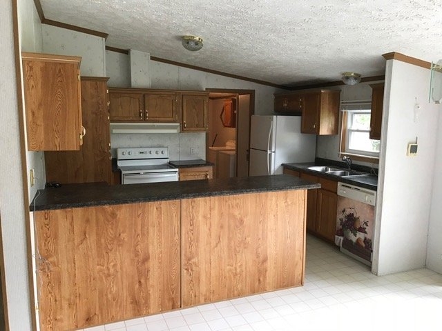 This 1998 DUTCH manufactured home 3 bedroom 2 Bath home with $15k in upgrades Inc Generator 13