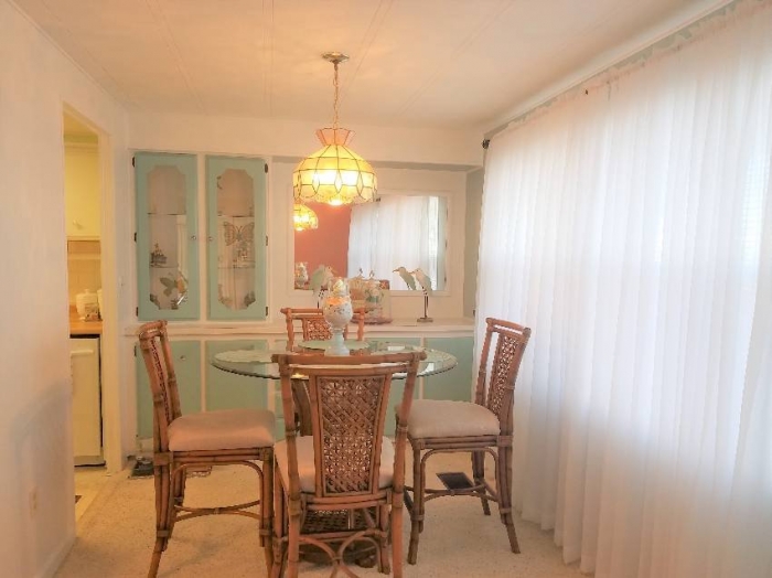 7415 Royal Crest Dr, Ellenton FL- Beautiful updated lake view home with two lanai's. 9