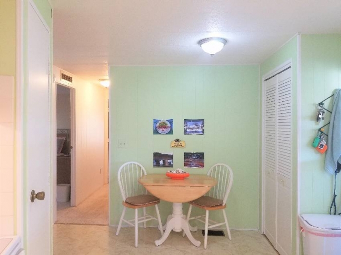 7415 Royal Crest Dr, Ellenton FL- Beautiful updated lake view home with two lanai's. 10