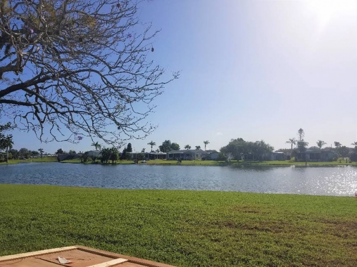 7415 Royal Crest Dr, Ellenton FL- Beautiful updated lake view home with two lanai's. 30