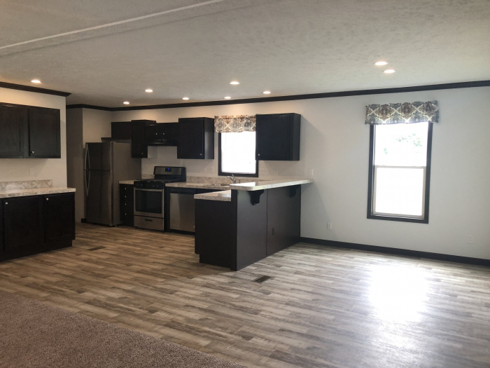 Beautiful open floor plan with tons of cupboard space! 4